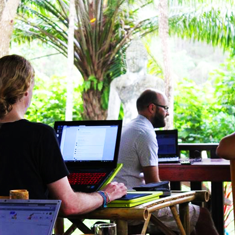 Remote workers work at coworking space in Koh Lanta, Thailand