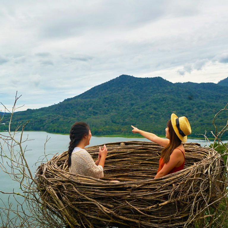 Remote workers sit in a life-sized nest in Bali, Indonesia