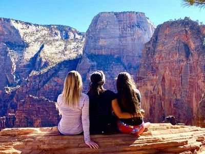 trio-of-remote-workers-overlooking-grand-canyon