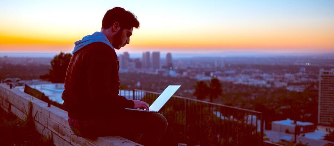 digital-nomad-working-at-sunset