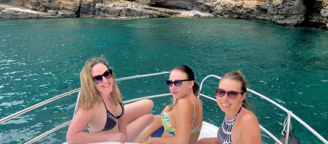 Remote workers on a boat in Italy as Hacker Paradise alumni