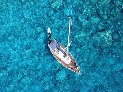 Aerial drone photo of luxury sail boat docked in tropical exotic bay with turquoise crystal clear sea DCIM100MEDIADJI_0512.JPG